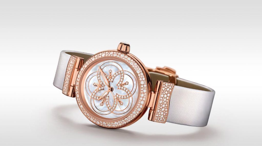 The white leather straps copy watches are decorated with diamonds.