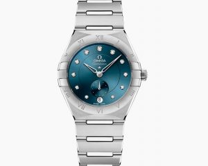 The stainless steel fake watch has diamond hour marks.
